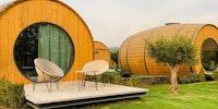 A vineyard in Portugal lets you sleep in a giant wine barrel, and it's every wine lover's dream come true